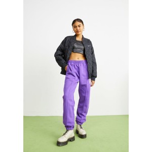 ナイキ レディース カジュアルパンツ ボトムス PANT - Tracksuit bottoms - purple purple