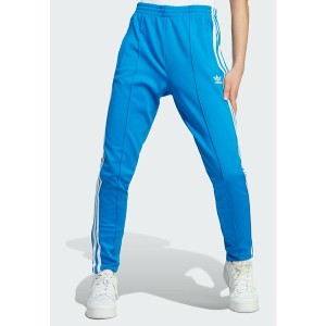 アディダスオリジナルス レディース カジュアルパンツ ボトムス CLASSIC TRACKPANT OPEN HEM - Tracksuit bottoms - blue bird blue bird