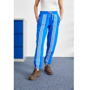 アディダスオリジナルス レディース カジュアルパンツ ボトムス ADICOLOR 70S PANTS - Tracksuit bottoms - bluebird bluebird/blue