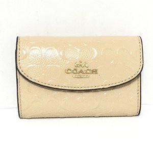 コーチ COACH キーケース レディース ミニシグネチャー柄 ベージュ エナメル（レザー）【中古】20240309