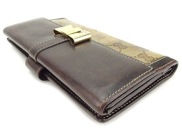 グッチ Wホック財布 長財布 二つ折り財布 財布 クリスタルGG 中古の  