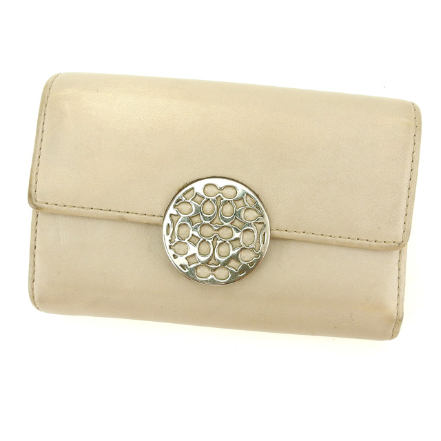 コーチ L字ファスナー財布 三つ折り財布 シグネチャープレート 中古の通販は 7,996円