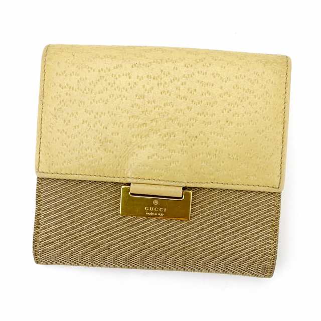 グッチ Wホック 財布 二つ折り ロゴプレート 中古の通販は