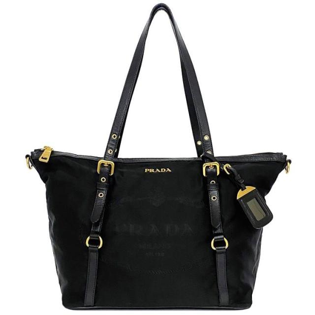プラダ トートバッグ ブラック ゴールド金具 NERO 美品 ファスナー ナイロン レザー 中古 PRADA 肩掛け ロゴ a4 ビジネス 定番 人気 女性 レディース 通勤 通学 シンプル お洒落 エレガント 黒色 革 トート 無地 カジュアル 高級感 上品 ブランド 本物 鑑定済みの通販は