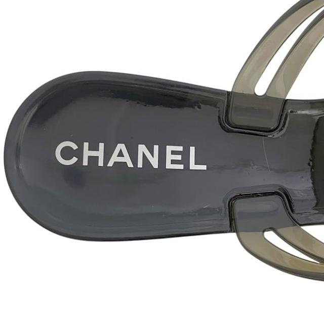シャネル サンダル ec-23958 ブラック カメリア G26012X01618 美品 23.5cm ラバー 中古 CHANEL 37 レディース ココマーク 履物 ロゴ 金具 人気 定番 お洒落 シンプル 高級感 エレガント 黒 クリア 女性 靴 モチーフ 花 カジュアル ブランド 本物 鑑定済み