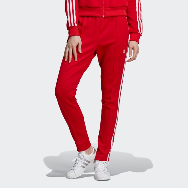 red sst track pants