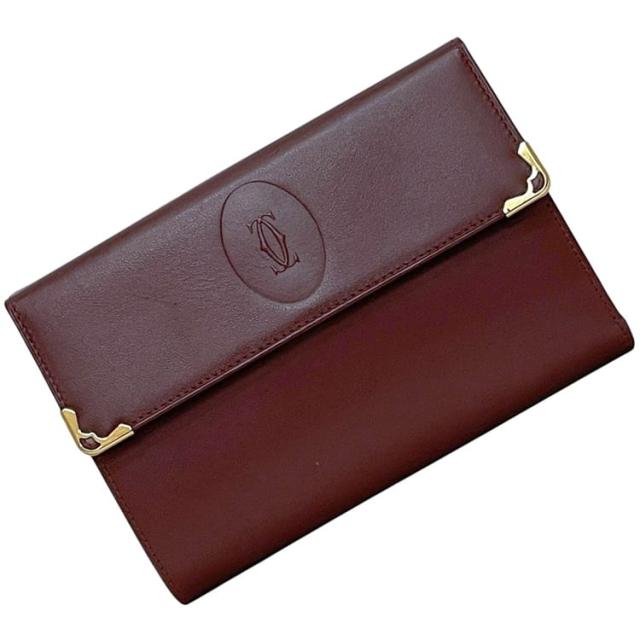 カルティエ 三つ折り 財布 ボルドー マスト 美品 レザー 中古 Cartier ホック ワンポイント ロゴ ワインレッド シンプル メンズ レディース 男女兼用 定番 人気 小銭入れ有 ヴィンテージ ロゴ刻印 ブランド 本物
