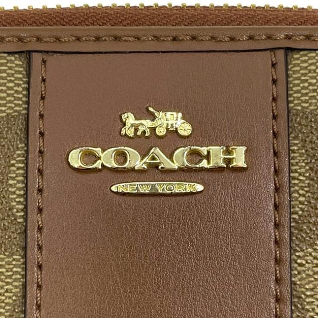 コーチ ラウンドファスナー 長財布 ブラウン シグネチャー F54630 財布