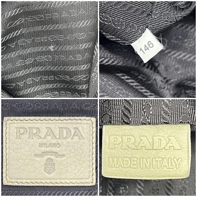 プラダ トートバッグ ベージュ 美品 レザー 中古 146 PRADA 革バッグ 書類 ビジネス ホック ワンポイント ロゴ エンボスロゴ レディース メンズ 定番 人気 シンプル 三角 ロゴプレート シルバー金具 軽い 軽量_2
