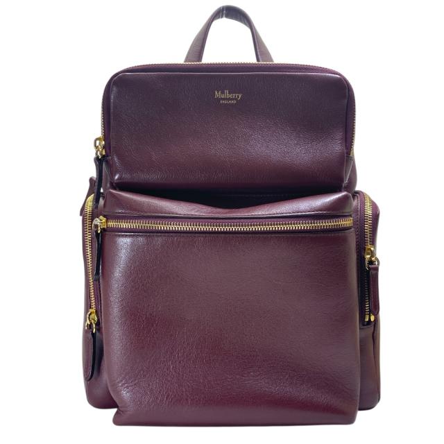 マルベリー レザー ジップ バックパック リュックサック ボルドー ゴールド ロゴ MULBERRY 洗練 上品 高級感 エレガント モダン スタイリッシュ 軽量 収納力 デイリー 旅行 長期愛用