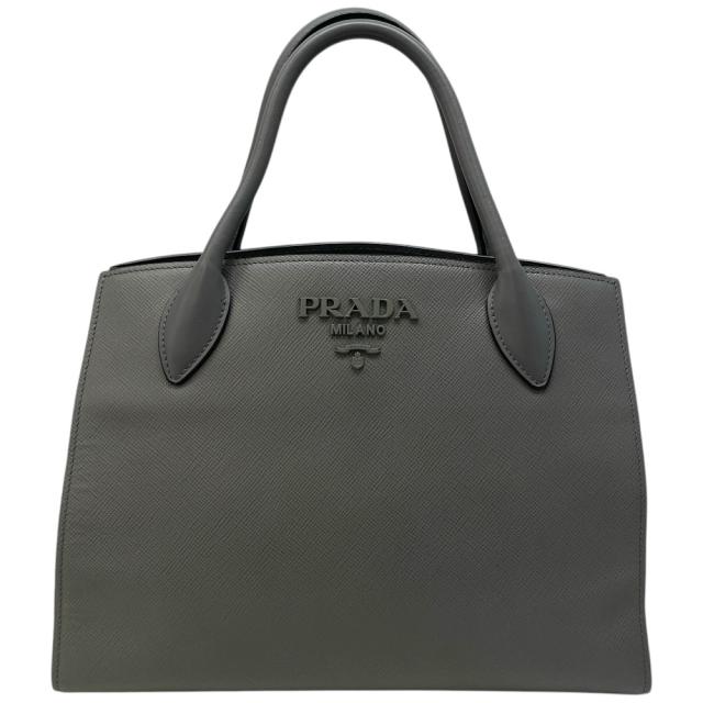 プラダ Monochrome ハンドバッグ トートバッグ ロゴ サフィアーノレザー 白タグ グレー PRADA 上品 洗練 高級感 エレガント デイリー 実用性 収納力 スタイリッシュ