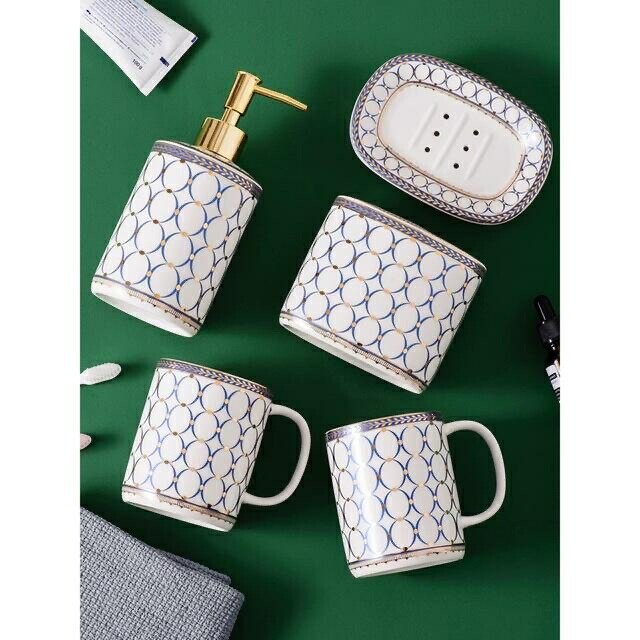 高級サニタリー5点セット．ディスペンサー 歯ブラシスタンド 洗面用品の通販は