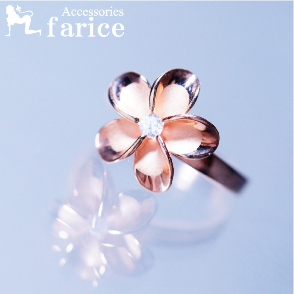 スイートピンクゴールドプルメリアの一輪キュービックジルコニアストーンハワイアンジュエリーリングの通販は 5,022円