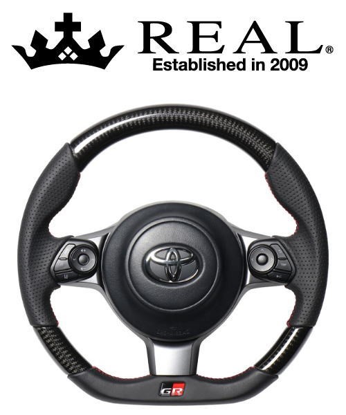 珍しい Real Steering オリジナルシリーズ エンブレムタイプ トヨタ プリウスphv Grスポーツ Zvw52用 ブラックカーボン レッド ブラックユーロ 21年春夏再入荷 Sunsetpressinc Com