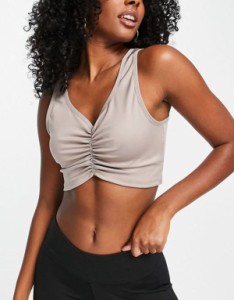 リーボック レディース タンクトップ トップス Reebok Training Studio ruched crop top in gray Gray