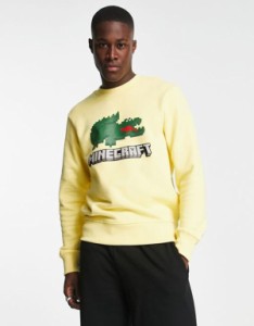 ラコステ メンズ パーカー・スウェット アウター Lacoste x Minecraft logo sweatshirt in yellow YELLOW