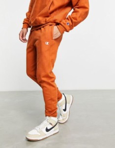 チャンピオン メンズ カジュアルパンツ ボトムス Champion small logo sweatpants in tan TAN