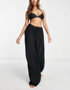 エイソス レディース カジュアルパンツ ボトムス ASOS DESIGN drawstring palazzo beach pants in black Black