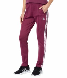 アディダス レディース カジュアルパンツ ボトムス Superstar Track Pants Victory Crimson