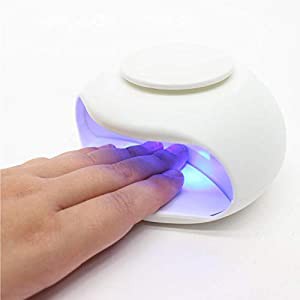 Nail dryer ネイルドライヤー 軽量・コンパクト設計 指を置くだけできれいに乾かせる UVライト ネイルライト(中古品)