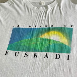 80年代 EUSKADI DEIA スペイン 新聞社 企業ロゴ 染み込みプリントTシャツ メンズXL-2XL相当 【古着】【中古】