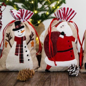 2枚セット クリスマス ラッピング 袋 梱包 巾着袋 不織布 贈り物 雪だるま サンタクロース トナカイ 18*30cm お菓子袋 ギフトバッグ 可愛