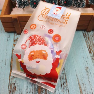 50PCS DIYクリスマスビスケットベーキングパッケージサンタクローススノーマンビスケットクッキースナックギフトバッグ