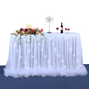 結婚披露宴の装飾のためのLEDライトが付いている糸のリボンのテーブルのスカート