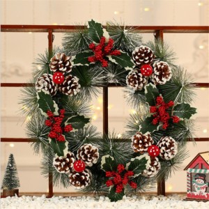 クリスマスはクリスマスの装飾の内部の外部のためのマツ円錐形の果実の花輪を模倣します