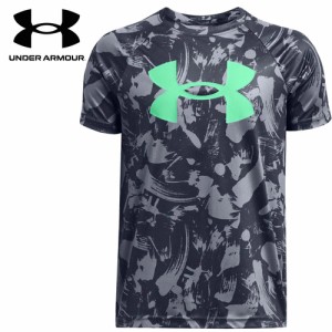 アンダーアーマー UNDER ARMOUR キッズ テック ショートスリーブTシャツ オールオーバープリント ビッグロゴ ダウンプアグレー/グリーン