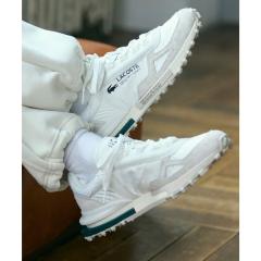 ���R�X�e�iLACOSTE�j/�����Y ELITE ACTIVE 223 1 SMA