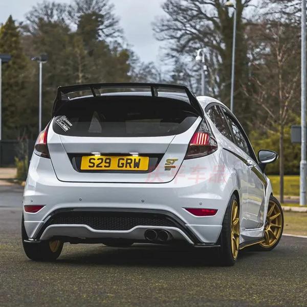 ST スタイルフォードフィエスタ MK6 2009-2014 リアリップバンパースポイラーディフューザープロテクター ABS プラスチック材料アクセサリーボディキット