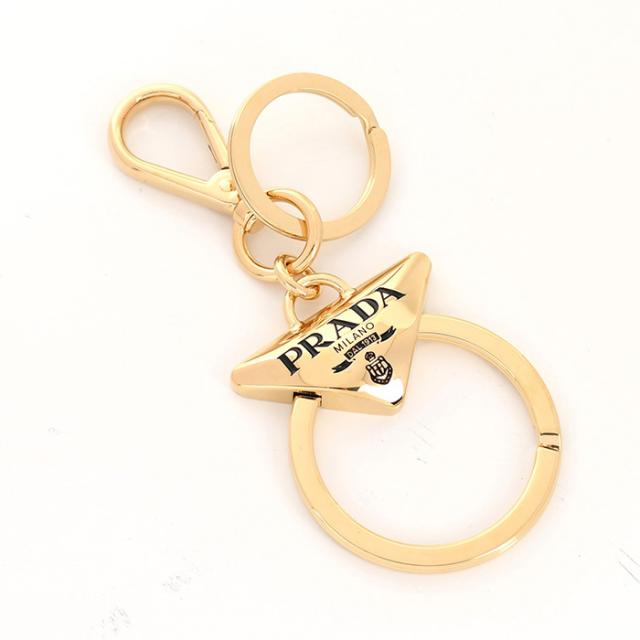 PRADA プラダ キーチャーム キーホルダー メタル キーリング 1PM037 66A レディース ゴールド トライアングルロゴ バッグチャームの通販は