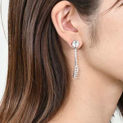 MIU MIU ミュウ ミュウ ピアス アクセサリー ロゴクリスタルピアス ...