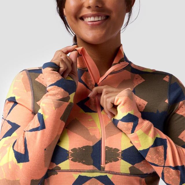 (取寄) バックカントリー レディース RWS メリノ ベースレイヤー— 1/4-ジップ トップ - ウィメンズ Backcountry women Cedars RWS Merino Mid-Wt Baselayer 1/4-Zip Top - Women's Peach Sky Geo Collage Print