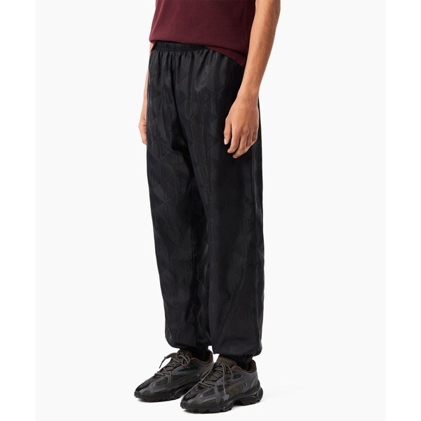 ラコステ LACOSTE モノグラム ジャカード トラックパンツ ネイビー