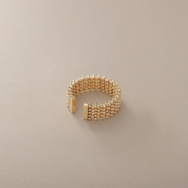 ココシュニック（COCOSHNIK）/K18ハニーカットボールオープン リング太の通販は 105,270円