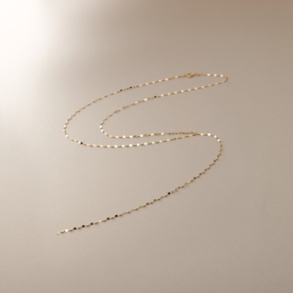 ココシュニック（COCOSHNIK）/K18フラワークロスY ネックレスの通販は 50,600円