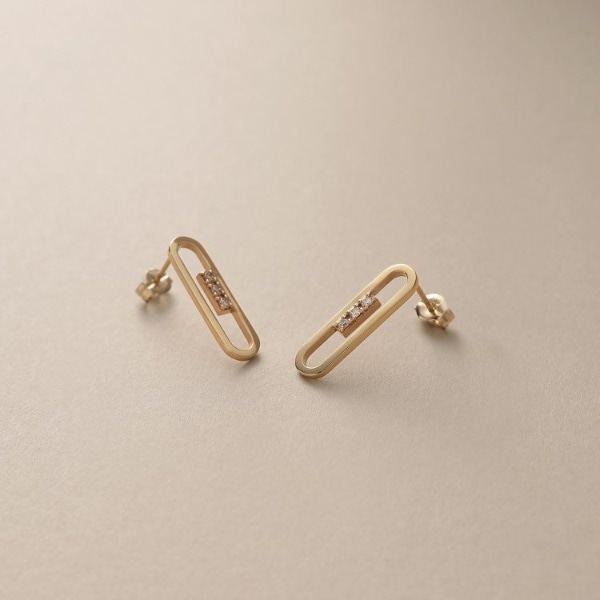 ココシュニック（COCOSHNIK）/K10ダイヤモンド トラックフレーム スタッドピアスの通販は