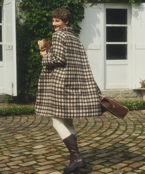 フィント/合皮パイピングダブル釦コートの通販は