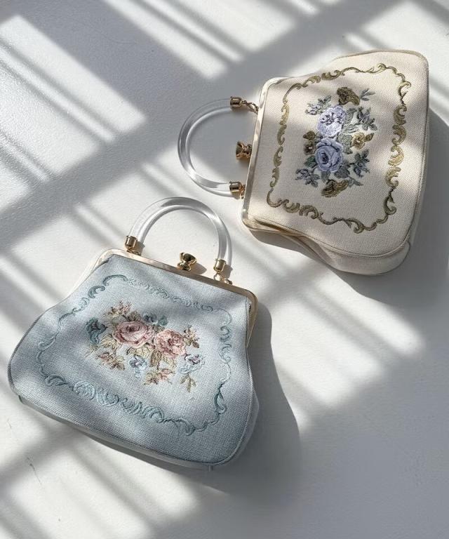 アンアナザーアンジェラス（an another angelus）/クリアハンドルローズ刺繍がま口バッグ