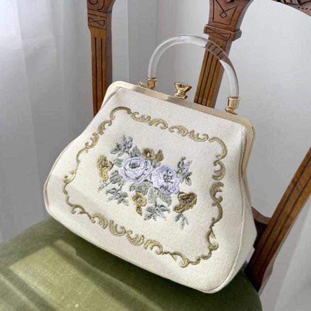 アンアナザーアンジェラス（an another angelus）/クリアハンドルローズ刺繍がま口バッグ