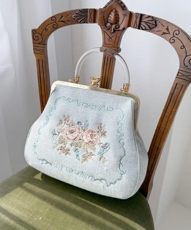 アンアナザーアンジェラス（an another angelus）/クリアハンドルローズ刺繍がま口バッグ