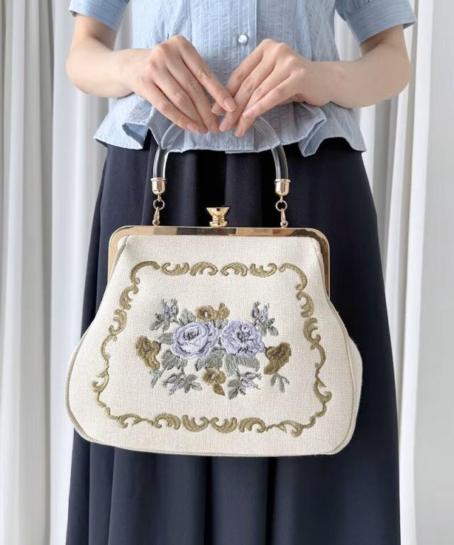 アンアナザーアンジェラス（an another angelus）/クリアハンドルローズ刺繍がま口バッグ
