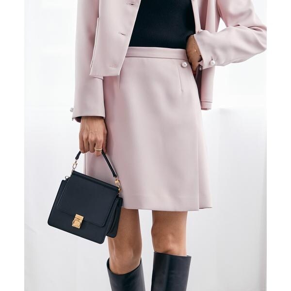 マーリエ ル カセット（Maglie le cassetto）/《曽田茉莉江コラボ》パールボタン巻きミニスカート