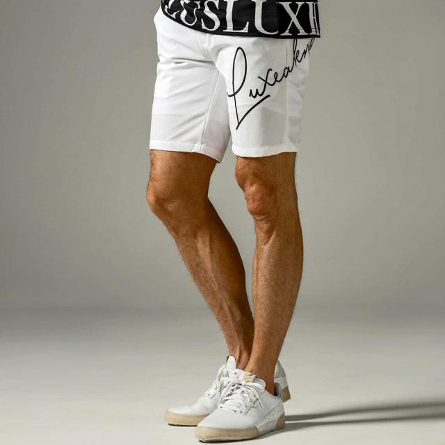 リュクスエイケイエムプラス/LUXEAKMPLUS カーシヴロゴスーパーストレッチハーフパンツの通販は 7,990円