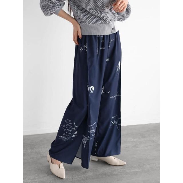 ラディエイト（RADIATE）/ランダムテキストプリントパンツ