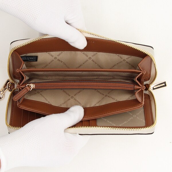 マイケル・コース（Michael Kors）/トラベル コンチネンタルウォレット
