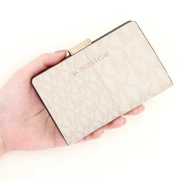 マイケル・コース（Michael Kors）/JET SET TRAVEL ビルフォールド ジップ コンパクトウォレット ミディアム