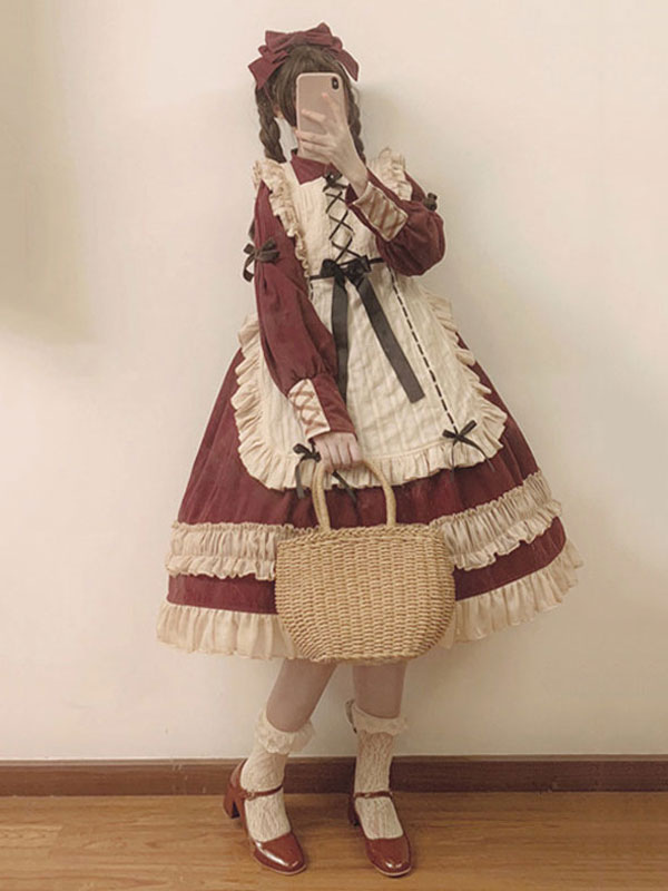 メイドスタイルロリータOPのレースのフリルの弓コットンロリータワンピースドレス